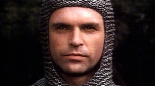 Sam Neill playing Lang Hancock in full armour