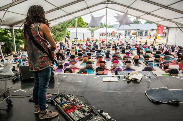 Arli Liebermann accompanying a yoga class at Wanderlust photo by Ali Lieberman
